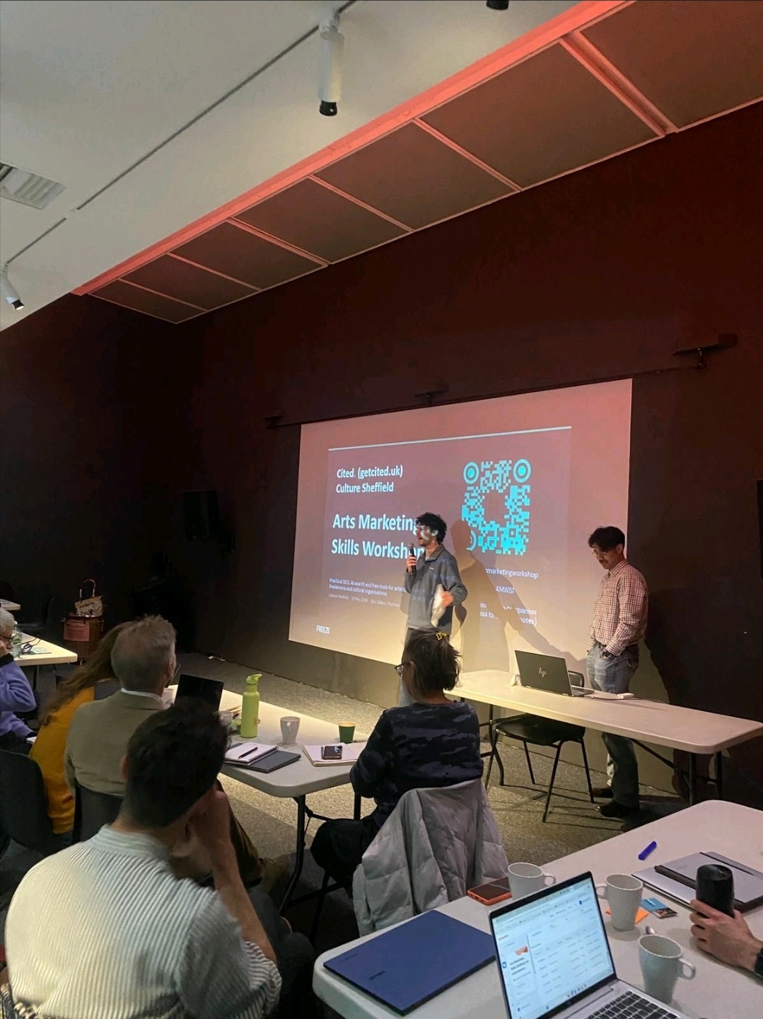 Akash presenting the Arts Marketing Skills Workshop to seated attendees at Site Gallery, Sheffield, with the Cited and Culture Sheffield title slide on screen